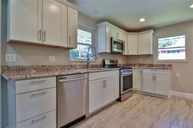Beautifully designed kitchen with brand new hardwo