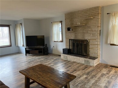 Newer laminate flooring & log burning fireplace