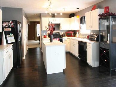 Kitchen. With the abundance of cabinets and the double door pantry, you ll never want for more Kitchen storage!