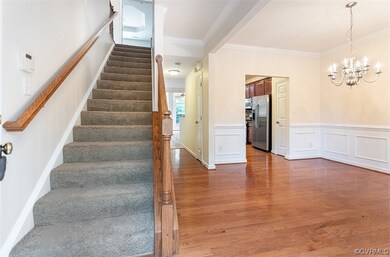 Warm hardwoods welcome you when you enter the home