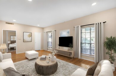 Virtual Staging - Living area with recessed lighting, plenty of natural light, and light wood-type flooring