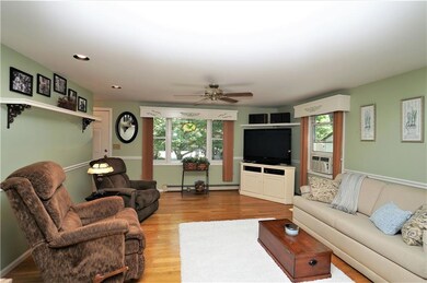 Living room with beautiful hardwood...