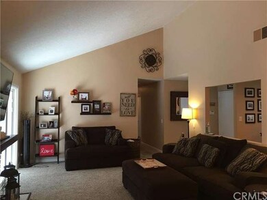 Living room with sliding glass door leading to the