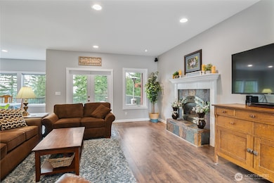 Just inside the Foyer and thru the short hall is the cozy and clean Living Room