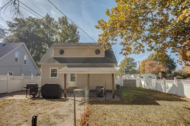 Back of home / features covered patio