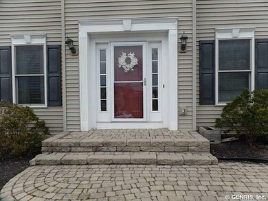 Exterior Front. Custom brick paver walkway and fro