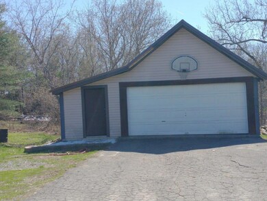 Garage with side shed