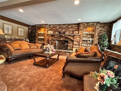 Family Room with Brick Fireplace Wall
