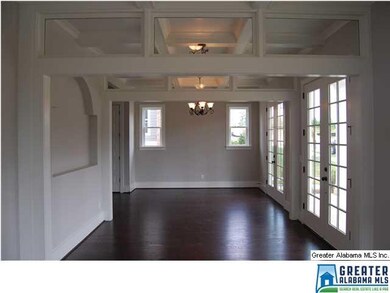 3 sets of 8 ft  Double Front Doors open into a lar