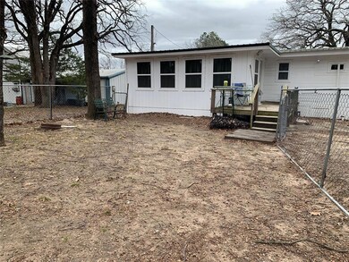 Back of property featuring fence