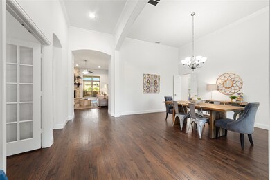 Welcome home! Such a grand entrance with tall ceilings and gorgeous real nail down hardwood floors with a light handscrape.