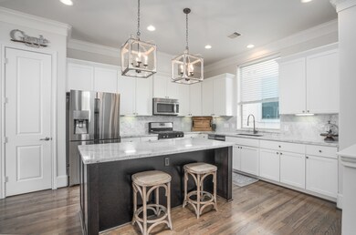 This gourmet kitchen boasts stainless steel applia