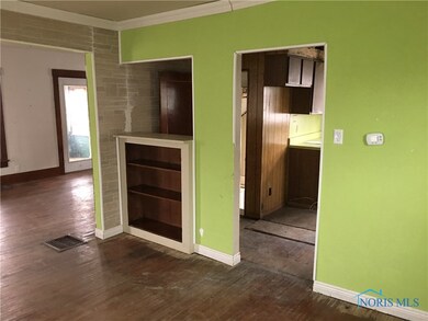 Dining room looking to kitchen.