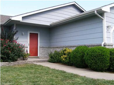 The entry is enhanced by the paver addition to the