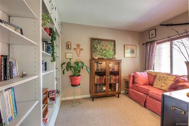 Private den/library off of family room