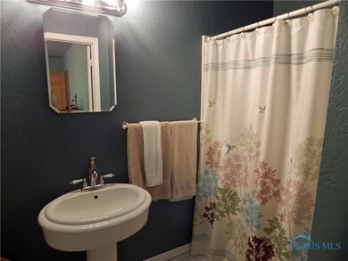 Master bathroom on main floor has tub/shower combo
