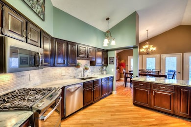 All stainless steel appliances, marble counters, u