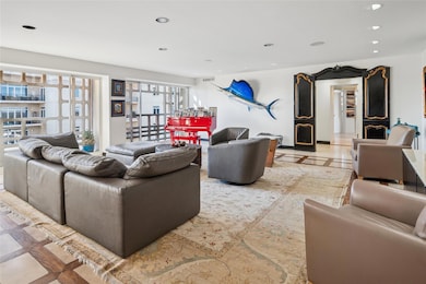 Spacious living area with sliding doors to balcony