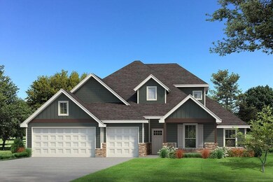 Craftsman-style house with a front lawn