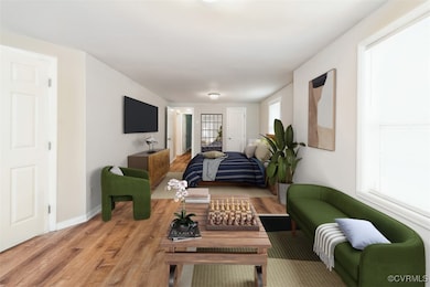 Living room featuring light wood finished floors a