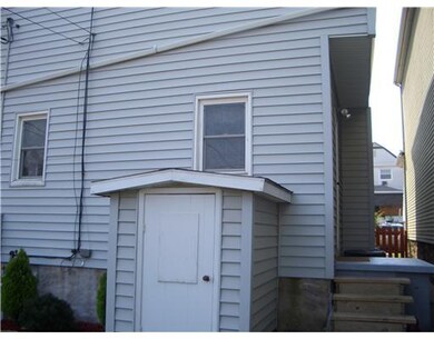 Exterior Back. House is brick and vinyl siding, wh