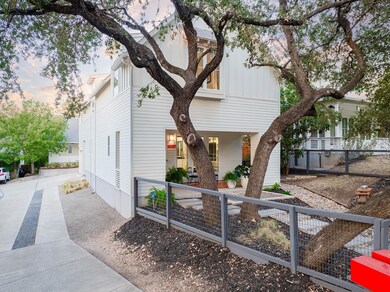 This fully detached residence has 2-3 dedicated parking spaces in addition to large 1-car garage w/high ceilings. 