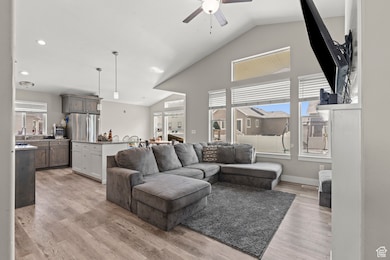 Great Room with large windows and vaulted ceilings.