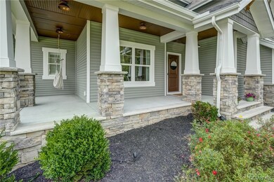 Landscaping offers just the right touch and is easy to care for.  The comfy hammock conveys and look at that gorgeous ceiling with custom lighting!