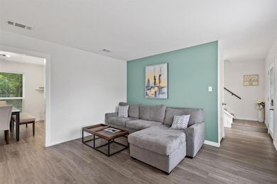 Living area featuring light wood-type flooring