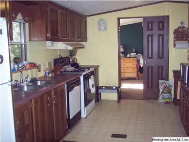 Large kitchen with dishwasher, stove and refrigera
