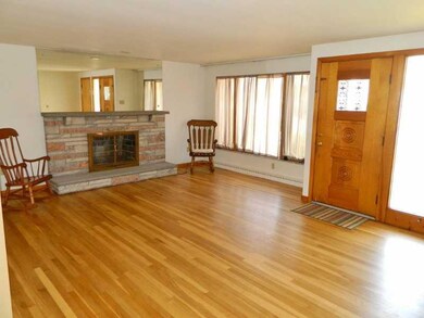 Living Room. Wood burning fireplace.  Very well li
