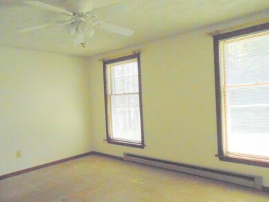 The master bedroom has a view of the...