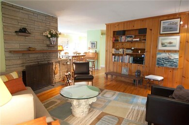 LIVING ROOM WITH PRETTY HARDWOODS
