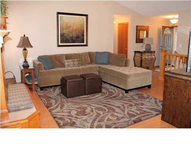Wood laminate flooring throughout the main floor l