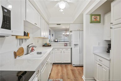 This view looks out to the Dining Area and Living
