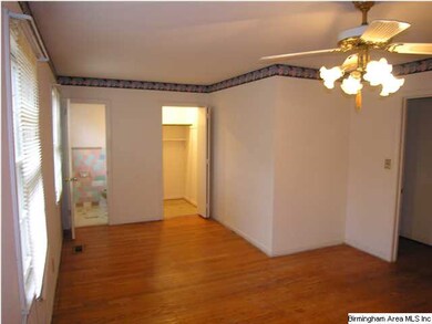 Master bedroom with half bath and another closet