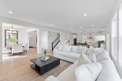 (Photo of a similar home, actual homes finished will vary) Another view of the main level.