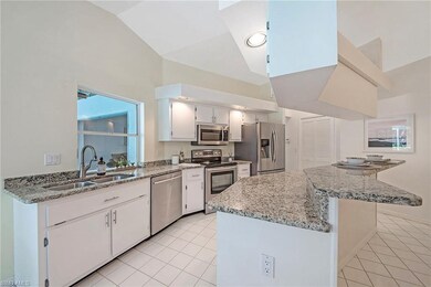 Kitchen with breakfast bar.