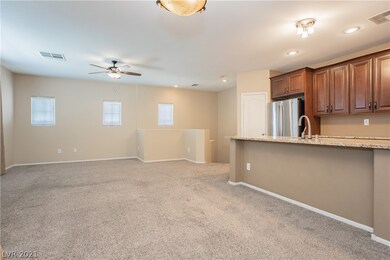 Island kitchen with granite counters, stainless st