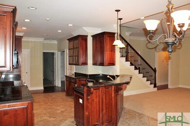 Kitchen with rich cherry cabinetry, ceramic tile, 