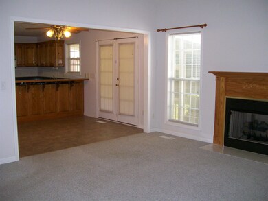 View From Living Room Of Kitchen Area And French Doors LeadingTo Screened in Patio !