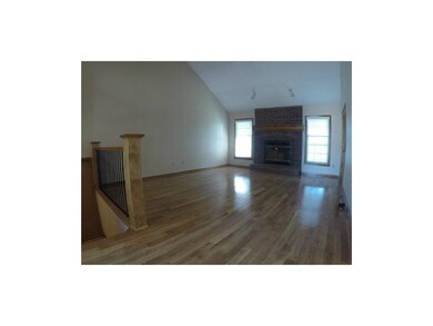 Clean & Sleek new Wrought Iron Rails & Wood Floors