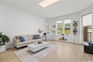 Upgraded living room with luxury vinyl flooring.