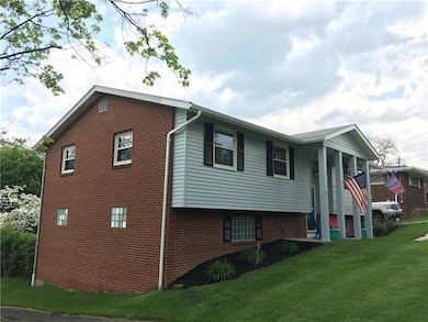 Freshly painted exterior.  Three sides full brick!