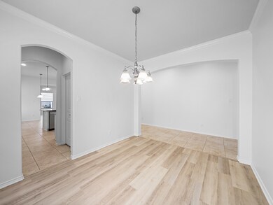 The expansive formal dining room is perfect for ho
