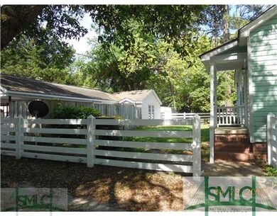 Other. Back yard with work shop / studio to the le