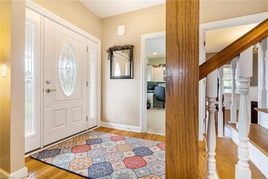 FRONT FOYER HAS A HARD WOOD FLOOR AND GREAT VIEWS 