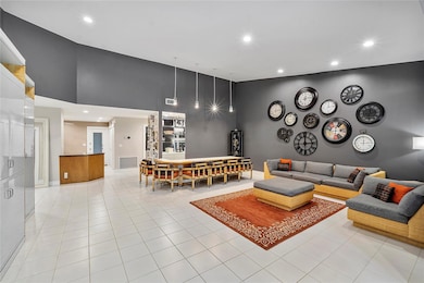 open living room w/16ft vaulted ceilings, entertai
