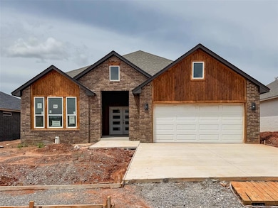 View of front facade featuring roof with shingles,