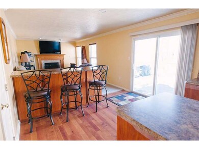 Kitchen. Eat in bar area in kitchen which opens to